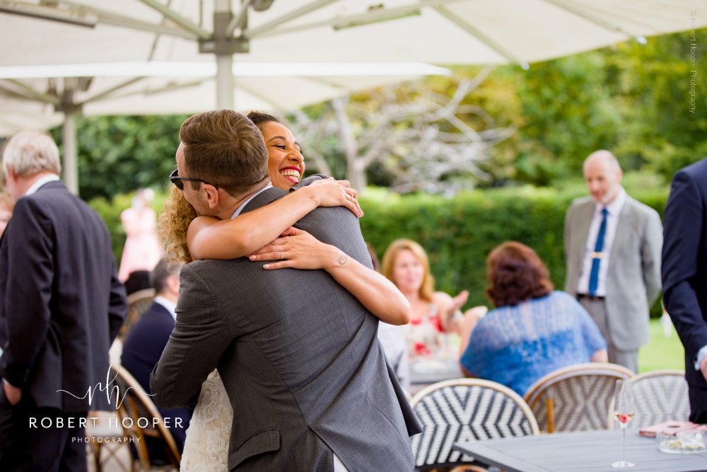 hug for bride on wedding day