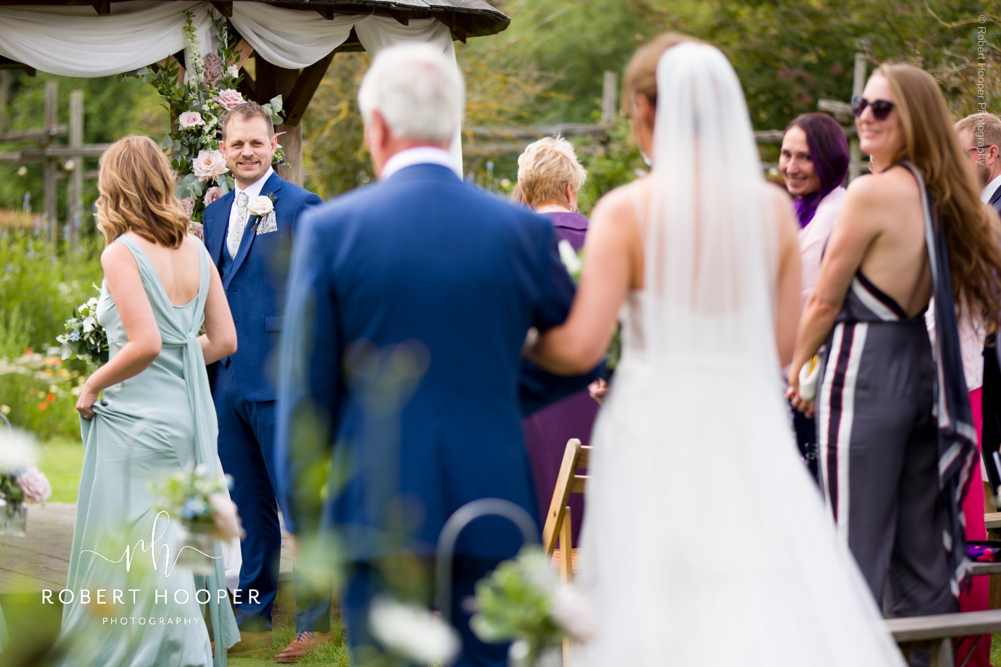 wedding guests hugging