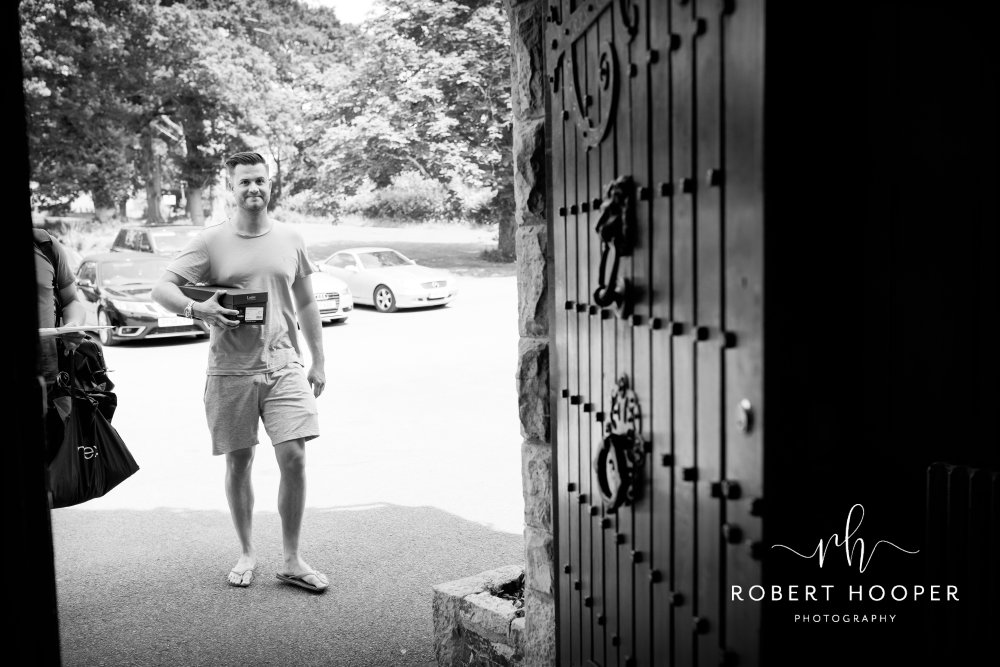 Groom arriving at wedding venue